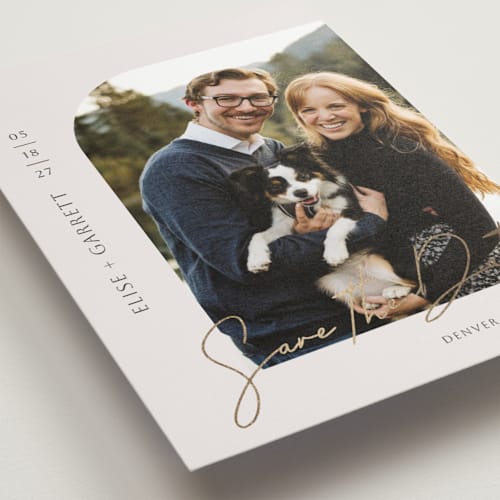 This is a sandstone foil stamped save the date cards with foil pressed by That Girl Press called modern arch printing on recycled smooth signature in standard