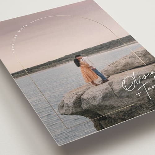 This is a classic foil stamped save the date cards with foil pressed by Kelly Schmidt called arch signature printing on recycled smooth signature in standard