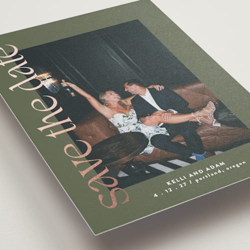 This is a sage foil stamped save the date cards with foil pressed by Roxy Cervantes called cover page printing on recycled smooth signature in standard