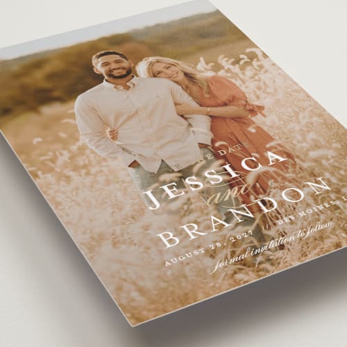 This is a quartz foil stamped save the date cards with foil pressed by Jennifer Postorino called formality printing on recycled smooth signature in standard