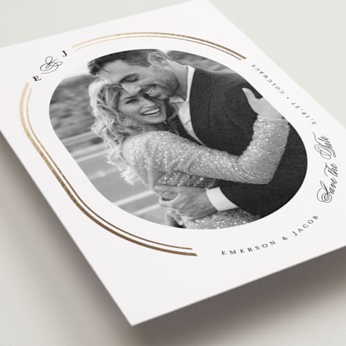 This is a opal foil stamped save the date cards with foil pressed by Emily Betts called framed oval printing on recycled smooth signature in standard