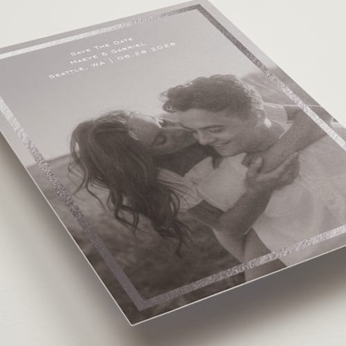 This is a quartz foil stamped save the date cards with foil pressed by Jenny Millington called boxed in printing on recycled smooth signature in standard