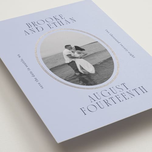 This is a blueberry foil stamped save the date cards with foil pressed by Angela Garrick called ethan printing on recycled smooth signature in standard