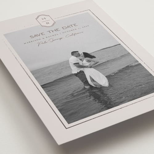 This is a dove foil stamped save the date cards with foil pressed by Rachelle Clarke called modern monogram printing on recycled smooth signature in standard