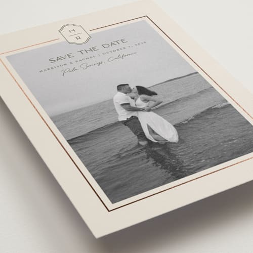This is a olive foil stamped save the date cards with foil pressed by Rachelle Clarke called modern monogram printing on recycled smooth signature in standard