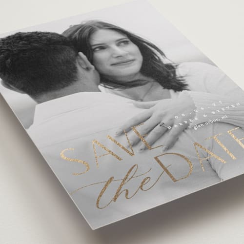 This is a snow foil stamped save the date cards with foil pressed by Pixel and Hank called yours forever printing on recycled smooth signature in standard