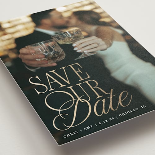 This is a pearl foil stamped save the date cards with foil pressed by Olivia Goree called celebration printing on recycled smooth signature in standard