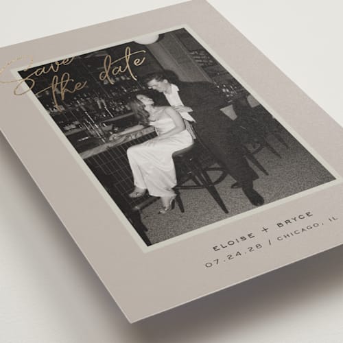 This is a taupe foil stamped save the date cards with foil pressed by Louise Kay called chic photo printing on recycled smooth signature in standard
