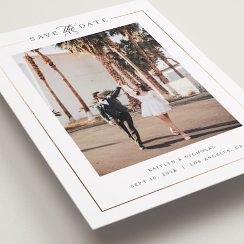 This is a pearl foil stamped save the date cards with foil pressed by Melanie Kosuge called mulholland printing on recycled smooth signature in standard