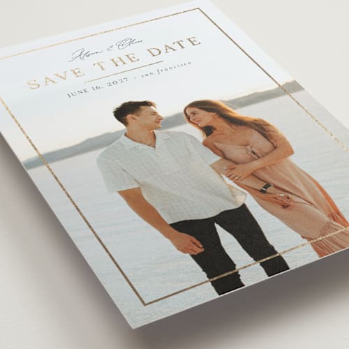 This is a shell foil stamped save the date cards with foil pressed by Nicole Walsh called surrounded by love printing on recycled smooth signature in standard