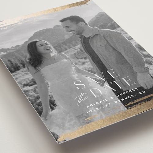This is a cloud foil stamped save the date cards with foil pressed by Carolyn Nicks called true love printing on recycled smooth signature in standard