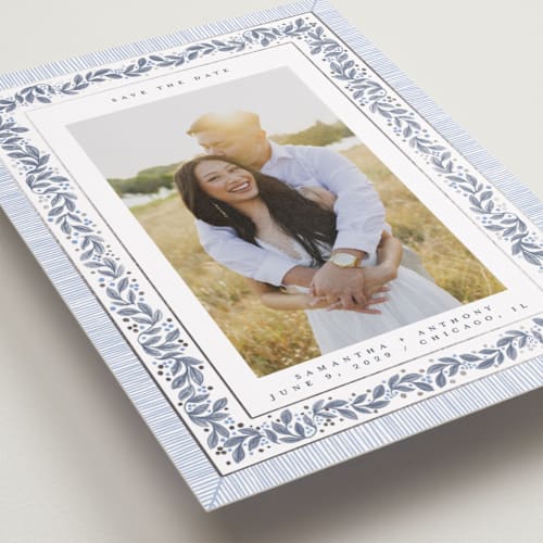 This is a periwinkle foil stamped save the date cards with foil pressed by Jenna Holcomb called antique greenery printing on recycled smooth signature in standard