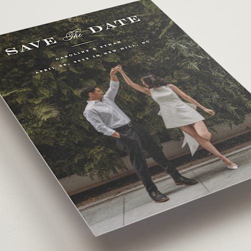 This is a gown save the date with standard by Carolyn MacLaren called proper printing on recycled smooth signature in standard