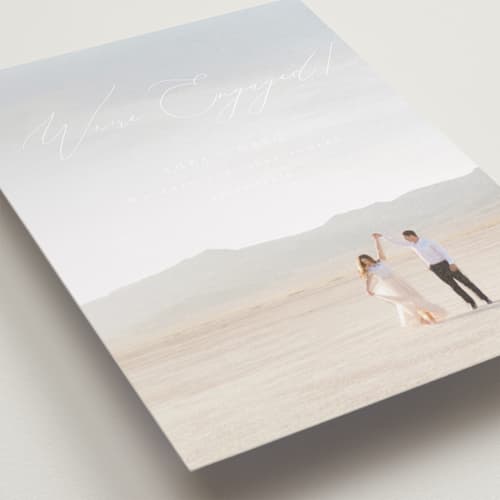 This is a snow save the date with standard by Snow and Ivy called enchantment printing on recycled smooth signature in standard