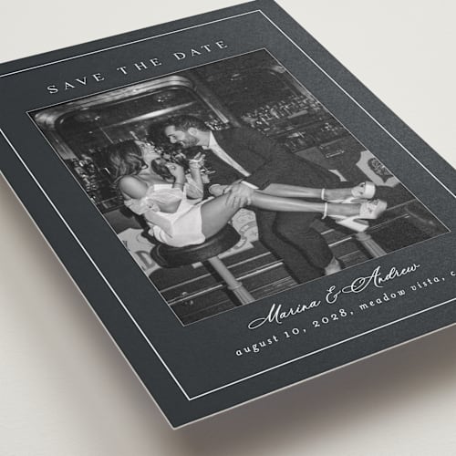 This is a navy blue save the date with standard by Nicole Walsh called refined printing on recycled smooth signature in standard