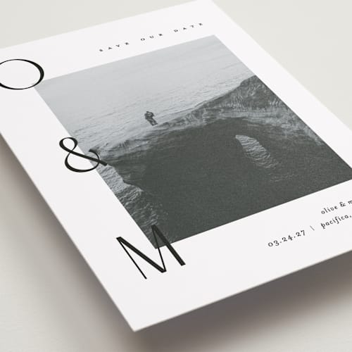 This is a moon save the date with standard by Pixel and Hank called initial printing on recycled smooth signature in standard