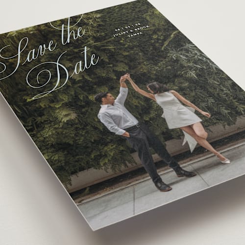 This is a skyline save the date with standard by Pixel and Hank called enamored printing on recycled smooth signature in standard
