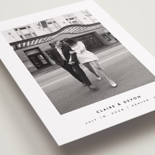 This is a silk save the date with standard by Kelly Schmidt called framed minimalist printing on recycled smooth signature in standard