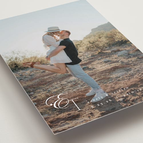 This is a quartz save the date with standard by Kristie Kern called whispered printing on recycled smooth signature in standard