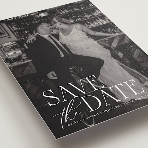 This is a silk save the date with standard by Kelly Schmidt called scripted initials printing on recycled smooth signature in standard
