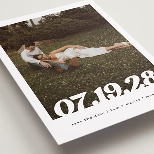 This is a pearl save the date with standard by Christie Garcia called sidele printing on recycled smooth signature in standard