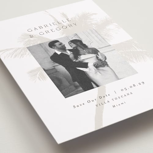 This is a ecru save the date with standard by AK Graphics called palm printing on recycled smooth signature in standard