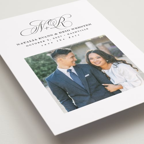 This is a newspaper save the date with standard by Lea Delaveris called elegant initials printing on recycled smooth signature in standard