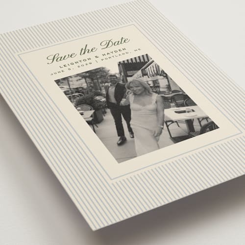 This is a pale blue save the date with standard by Ellen Schlegelmilch called hayden printing on recycled smooth signature in standard