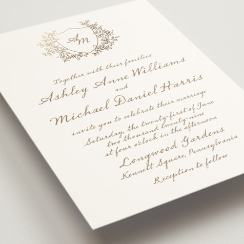 This is a ivory foil stamped wedding invitations with foil pressed by Cass Loh called boho flower crest printing on signature in standard