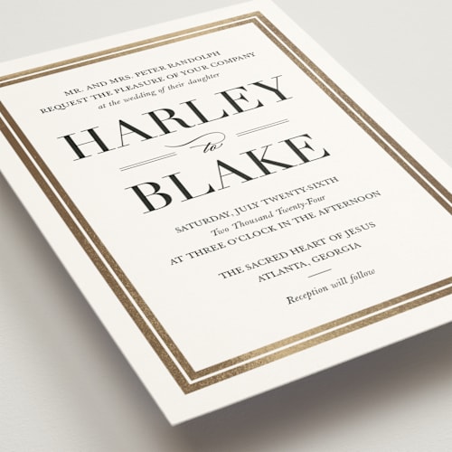 This is a golden foil stamped wedding invitations with foil pressed by Stacey Meacham called gilded frame printing on signature in standard