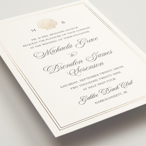 This is a vermeil foil stamped wedding invitations with foil pressed by Griffinbell Paper Co. called seaside printing on signature in standard