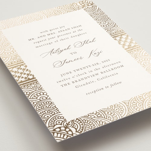 This is a lily foil stamped wedding invitations with foil pressed by Mansi Verma called gilded henna printing on signature in standard
