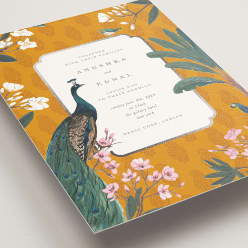 This is a turmeric foil stamped wedding invitations with foil pressed by Teju Reval called royal wedding printing on signature in standard