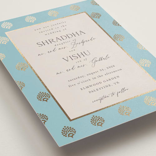 This is a celestial foil stamped wedding invitations with foil pressed by Deynaaz Daraei called shraddha printing on signature in standard