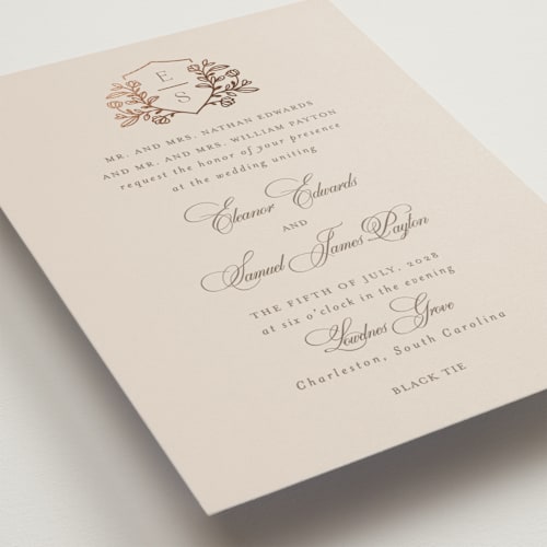 This is a eggshell foil stamped wedding invitations with foil pressed by Mansi Verma called gold crest printing on signature in standard