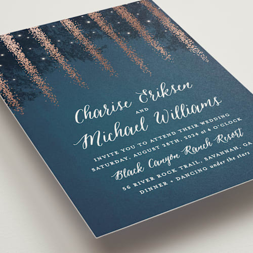 This is a navy foil stamped wedding invitations with foil pressed by Hooray Creative called strands of lights printing on signature in standard