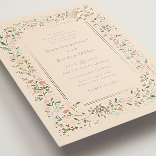 This is a ivory foil stamped wedding invitations with foil pressed by Jennifer Wick called esther's garden printing on signature in standard