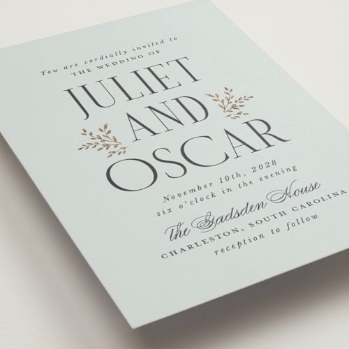 This is a mist foil stamped wedding invitations with foil pressed by Laura Hankins called enchanted printing on signature in standard