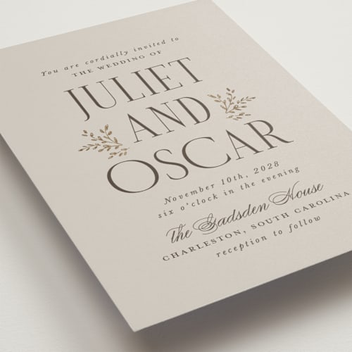 This is a pebble foil stamped wedding invitations with foil pressed by Laura Hankins called enchanted printing on signature in standard