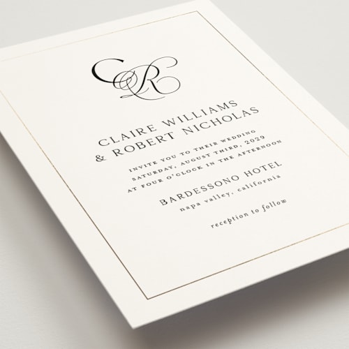 This is a silk foil stamped wedding invitations with foil pressed by Kelly Schmidt called monogram script printing on signature in standard