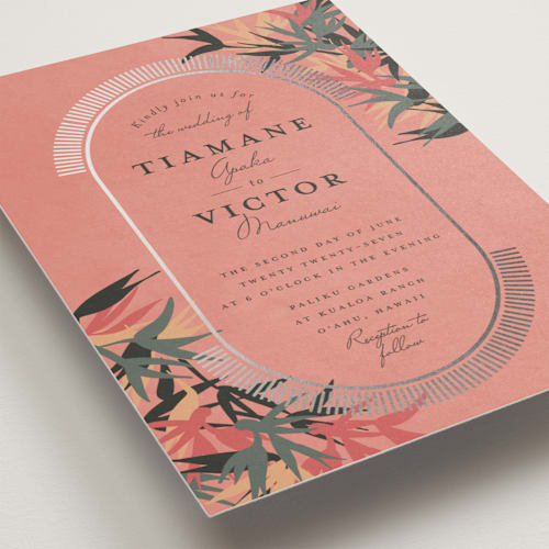 This is a coral foil stamped wedding invitations with foil pressed by Julie Hebert called birds of paradise printing on signature in standard