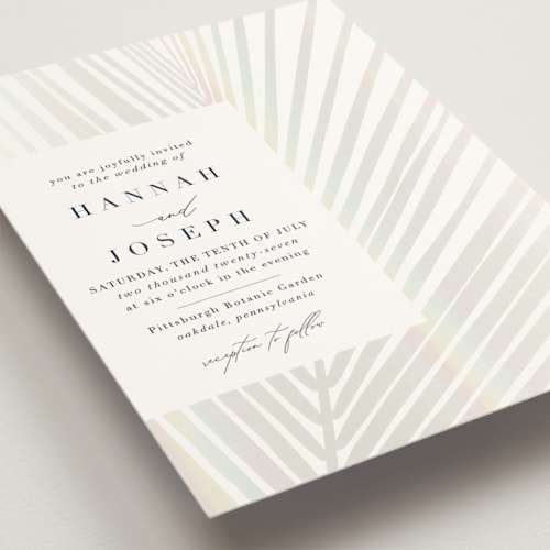 This is a pearl gloss press wedding invitations with foil pressed by Robin Ott called pristine printing on signature in standard