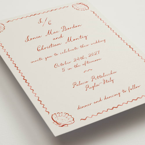 This is a coral wedding invitations with standard by Pati Cascino called puglia printing on signature in standard