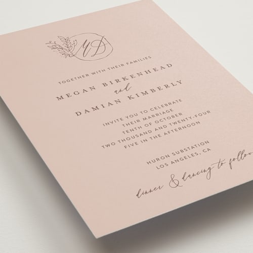 This is a blush wedding invitations with standard by Lucrecia Caporale called delicate monogram printing on signature in standard