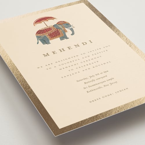 This is a honey foil stamped wedding invitations with foil pressed by Teju Reval called indian elephant printing on signature in standard