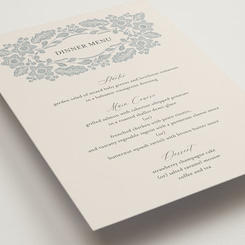 This is a dusty blue menu cards with standard by Jen Owens called embroidered printing on signature in standard