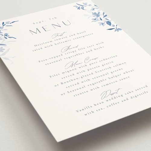 This is a cobalt menu cards with standard by Everett Paper Goods called fleur printing on signature in 5x7