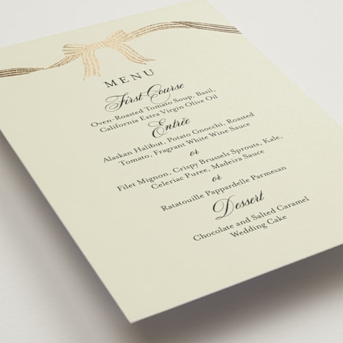 This is a champagne menu cards with foil pressed by Chris Griffith called all tied up printing on signature in 5x7