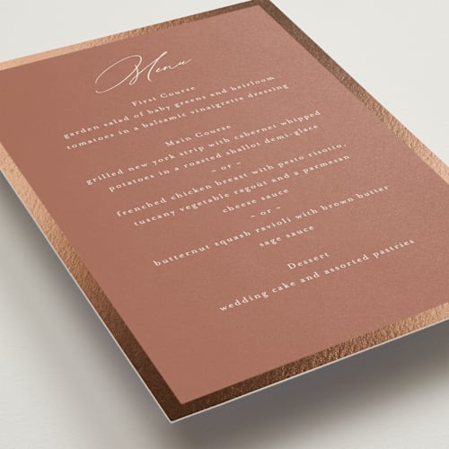 This is a terracotta menu cards with foil pressed by Nicole Walsh called surround printing on signature in standard