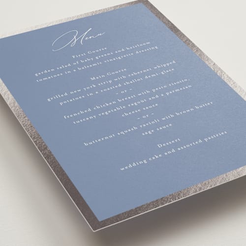 This is a cornflower blue menu cards with foil pressed by Nicole Walsh called surround printing on signature in standard